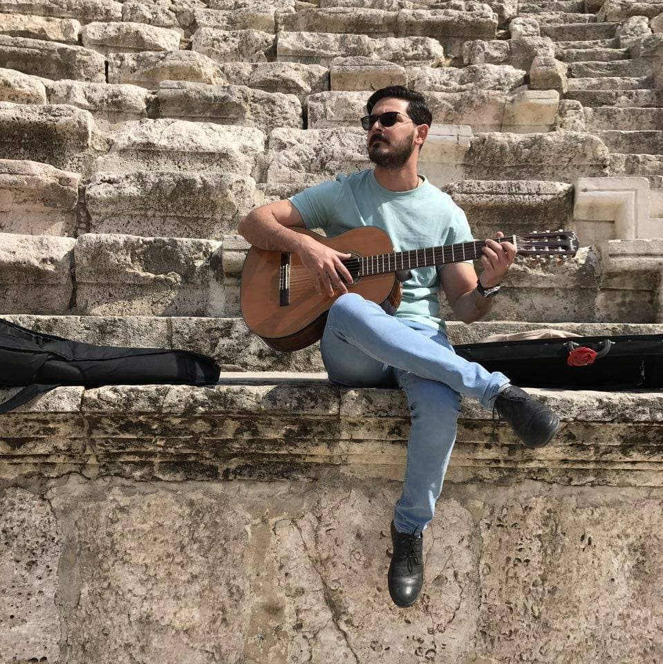 Playing Guitar Under ISIS